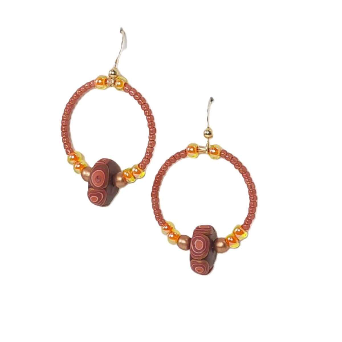 Pair of hoop earrings with beads on a white background