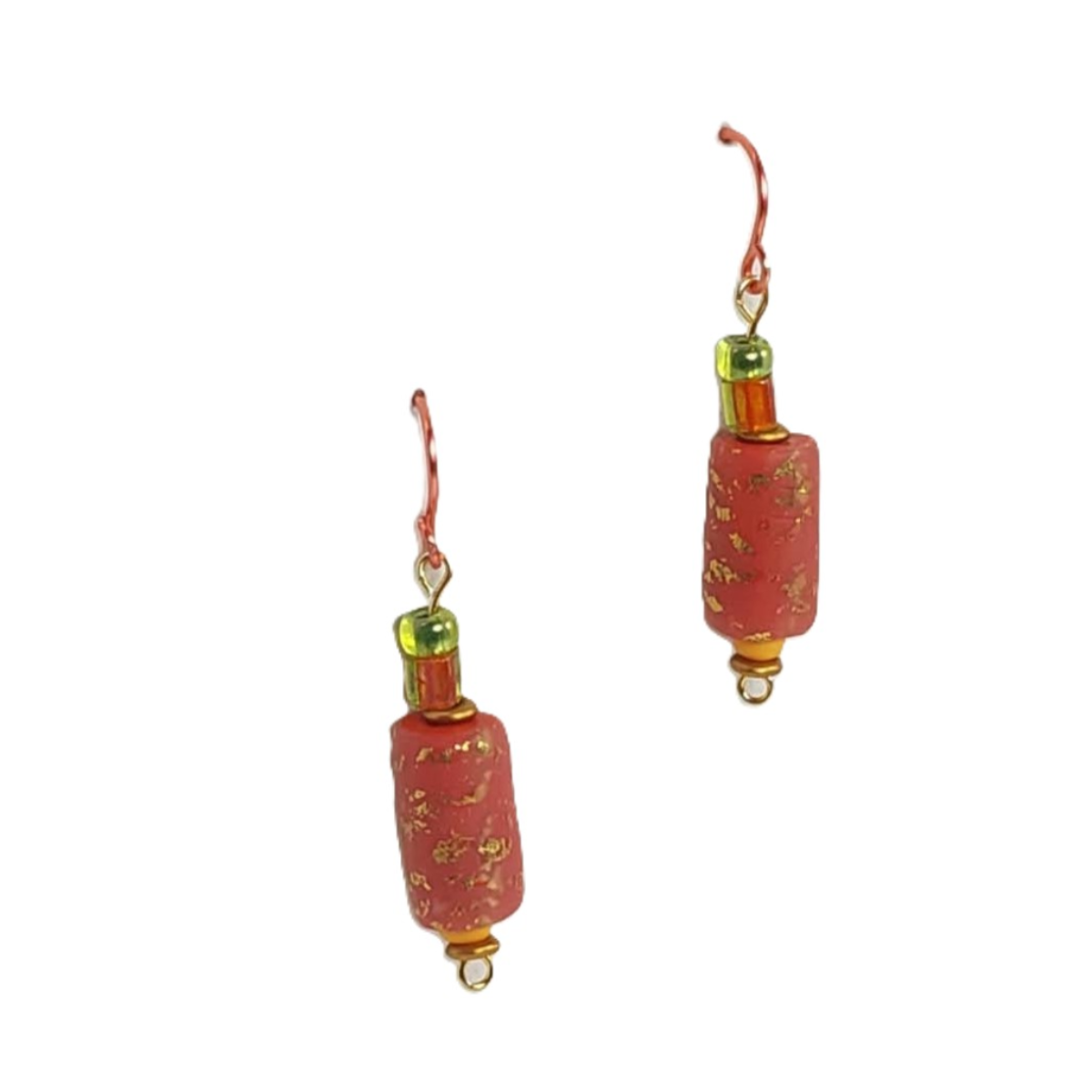 Pair of bright terracotta and gold earrings on a white background