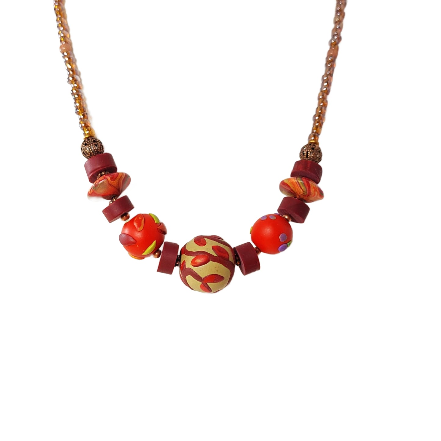 Women's beaded necklace in fall colors with leaf, vine and berry design. One-of-a-kind design adds elegance to your outfit. Lightweight and comfortable to wear. Free shipping in the US.